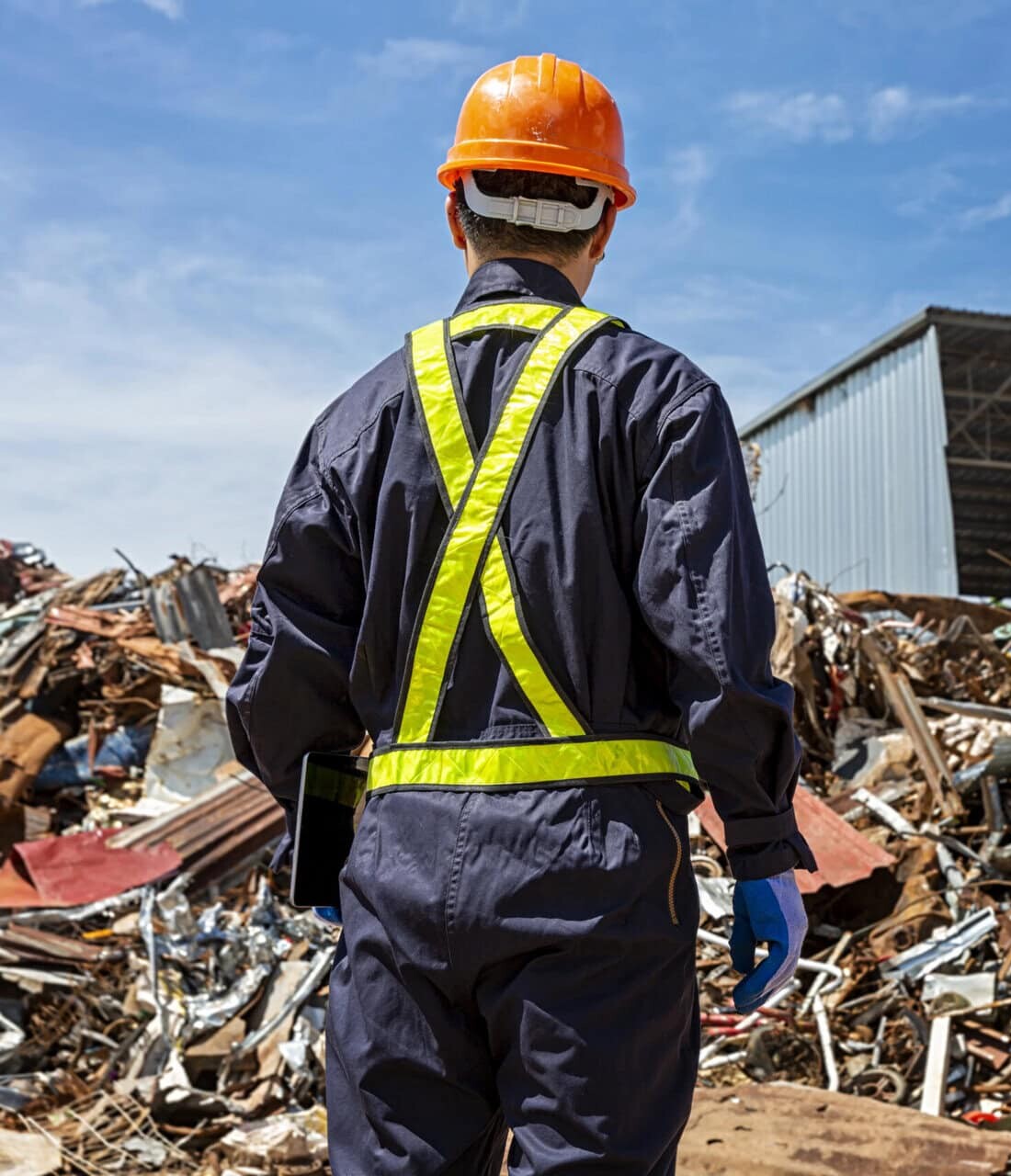 An engineer looking at recycling waste To proceed to the next process.